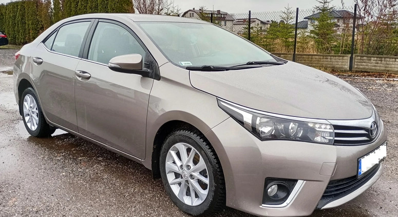 Toyota Corolla cena 49999 przebieg: 128000, rok produkcji 2015 z Warszawa małe 154